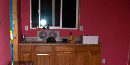 Louise Blue Granite Table in the Kitchen at Night.